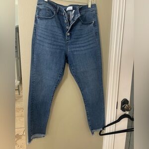 Loft skinny jeans.  Size 31/12.  Medium wash with a raw hem